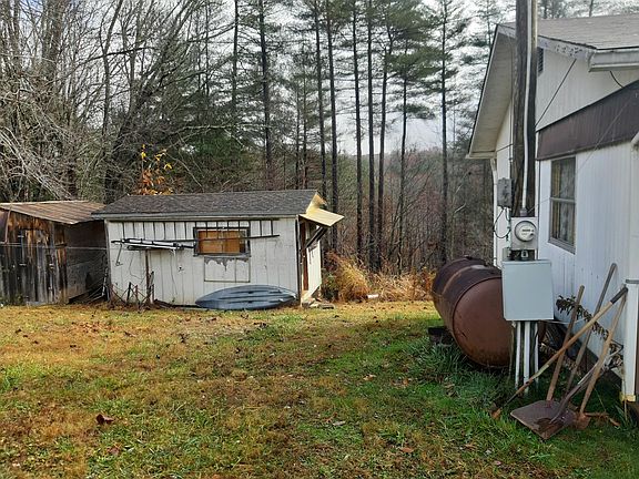 Those 2 sheds and a chicken coop off the hill.