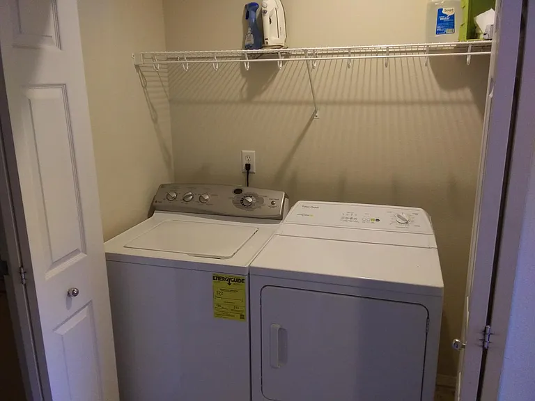 Upstairs laundry closet w/washer and dryer