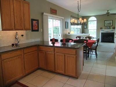 View of Counters, eating area and family room