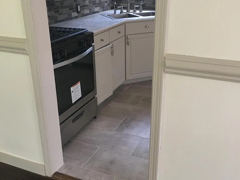 New tile floors in kitchen and laundry room