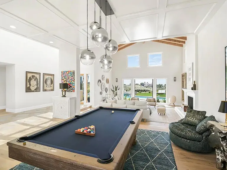 Pool table in the living space making it the ultimate fun getaway for all.