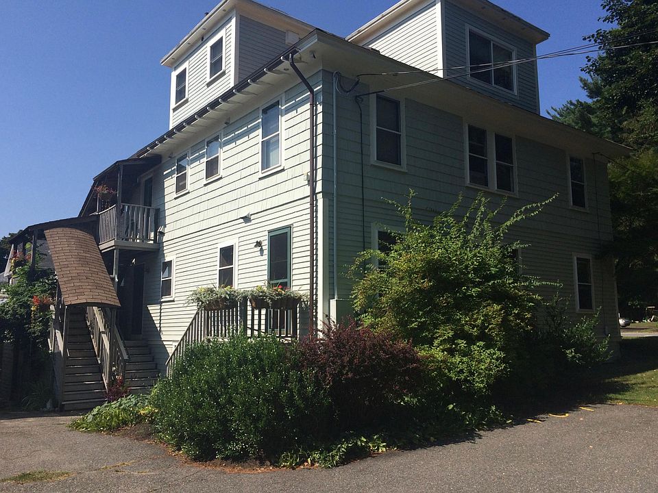 Back side of house and entrances to apartments