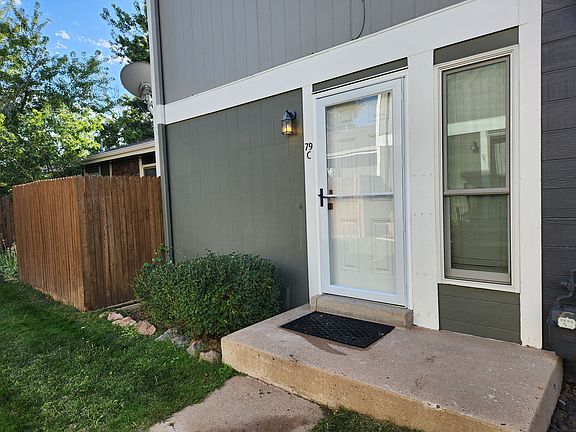 Exterior entry with new storm door.