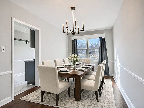 Elegant dining room conveniently located next to the kitchen and famiy room.