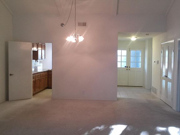 Formal dining area connected to kitchen