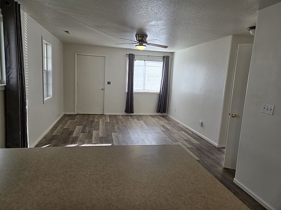 Front room space works nicely as living room and lots of light