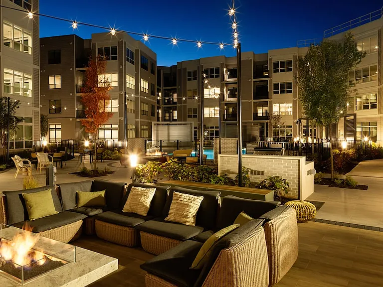 Courtyard with BBQ grills, fireplace, and lounge seating