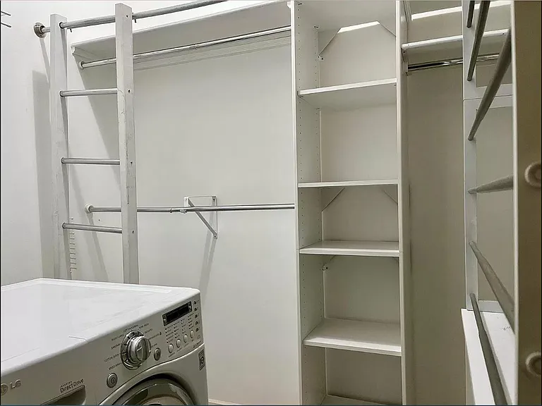 All in 1 washer and dryer located in the opened closet. Plenty of room in 1 closet space.