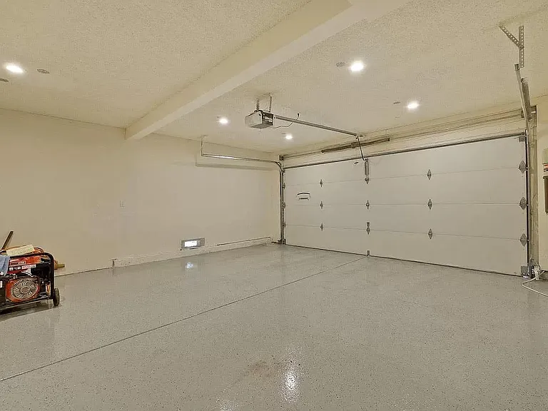 Two car garage with storage area