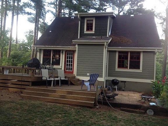 Back of the home with three tiered deck