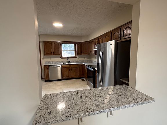 Kitchen with bar nook.