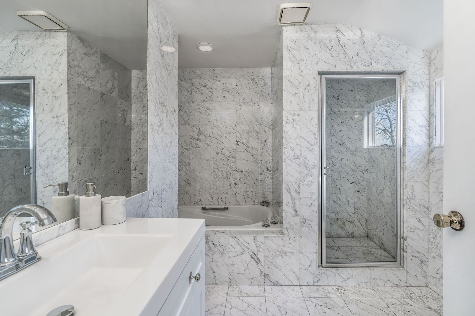  Upstairs Primary Ensuite Bath with Carrera Marble
