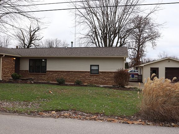 Front of house & main garage
