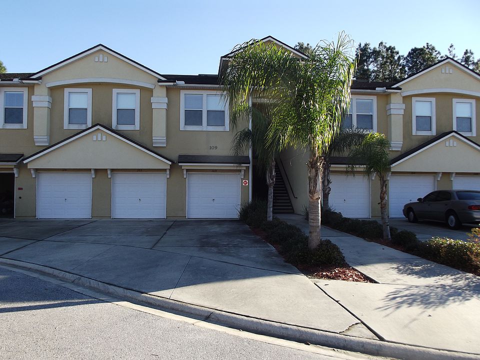 Condo is left of the palms