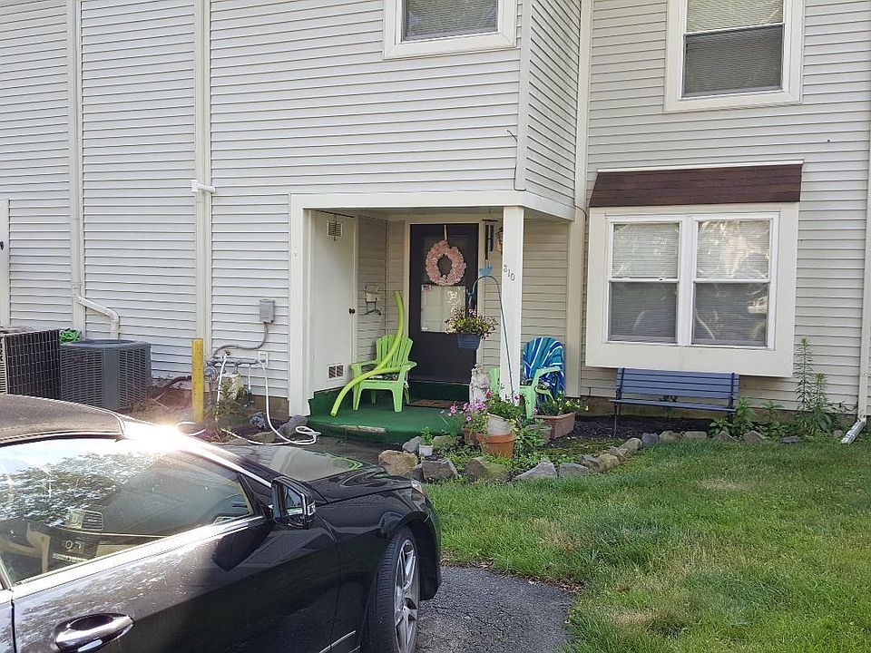 Front of Rental showing one of two reserved parking spots