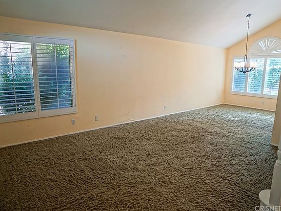 Large formal living room just off dining room with