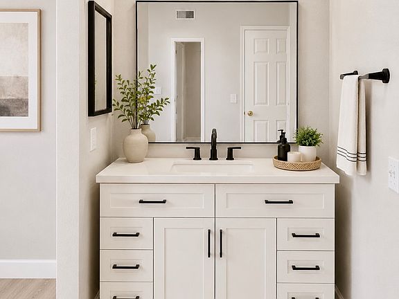 new vanity and accessories in master bedroom
