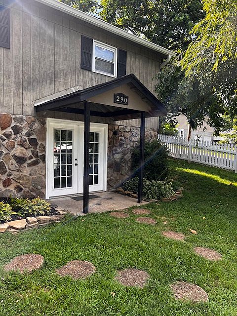 French door entrance into lower story (basement)