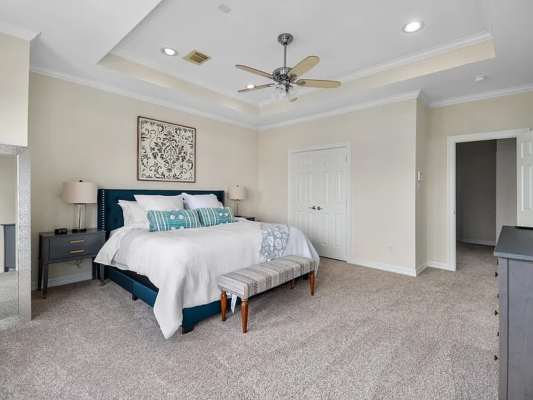 Large master bedroom with multiple closets