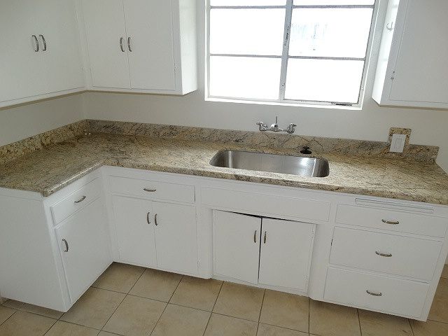 New Granite countertops and stainless steel sink