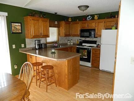 Kitchen
						:
						New counter, sink, and backsplash in 2010.