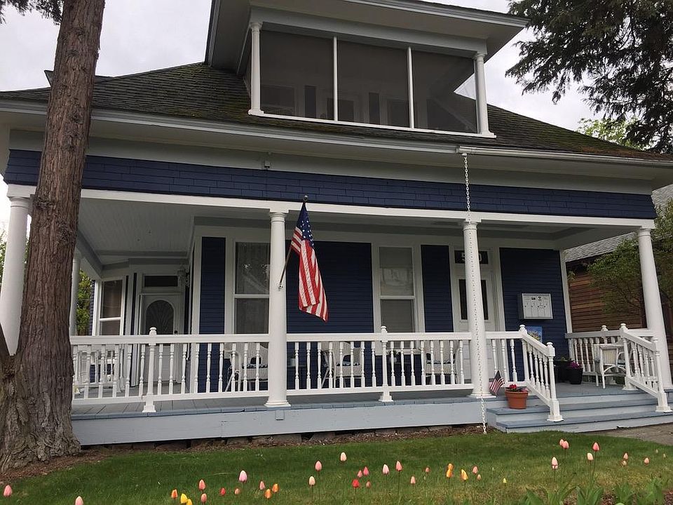 Front porch with tulips blooming
