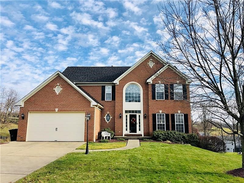 Welcoming Curb Appeal with Two-Car Attached Garage.