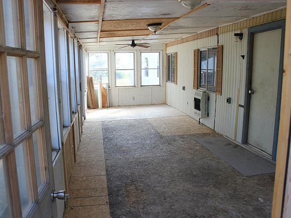 Front porch. Has sliding glass door leading to covered BBQ