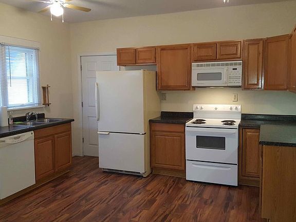 Kitchen includes appliances including refrigerator