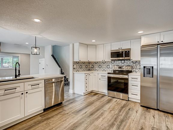 Main house kitchen with beautiful upgrades, stainless steel appliances etc..