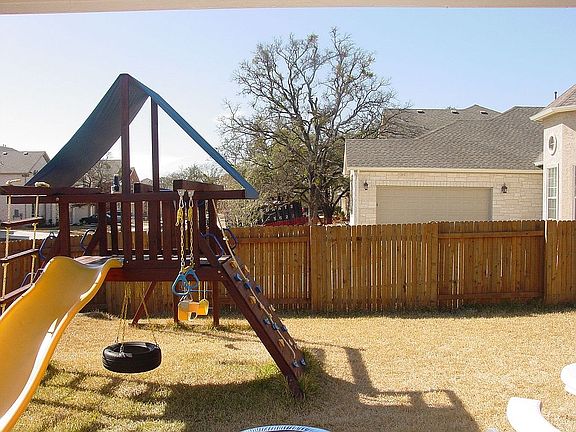 Large backyard w/ kids playscape