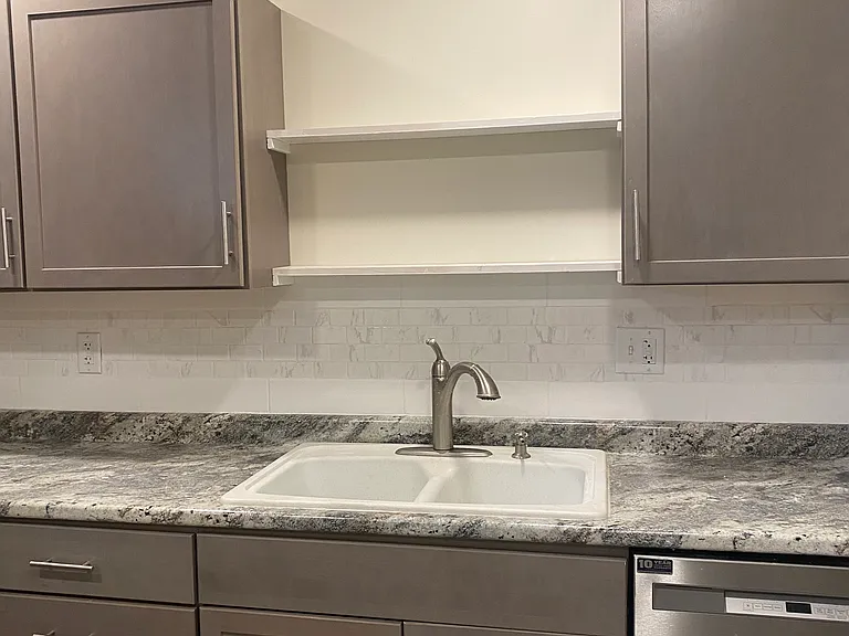 Custom shelving above the sink.