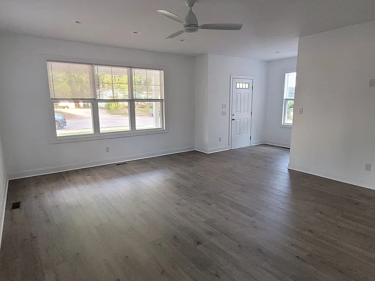 Open concept living room, kitchen and dining area