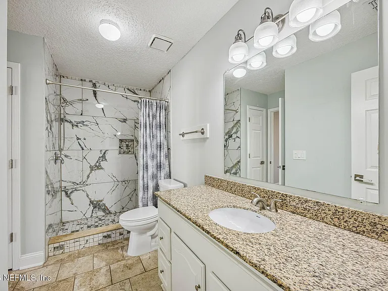 3447 Heron Dr N — Photo 26