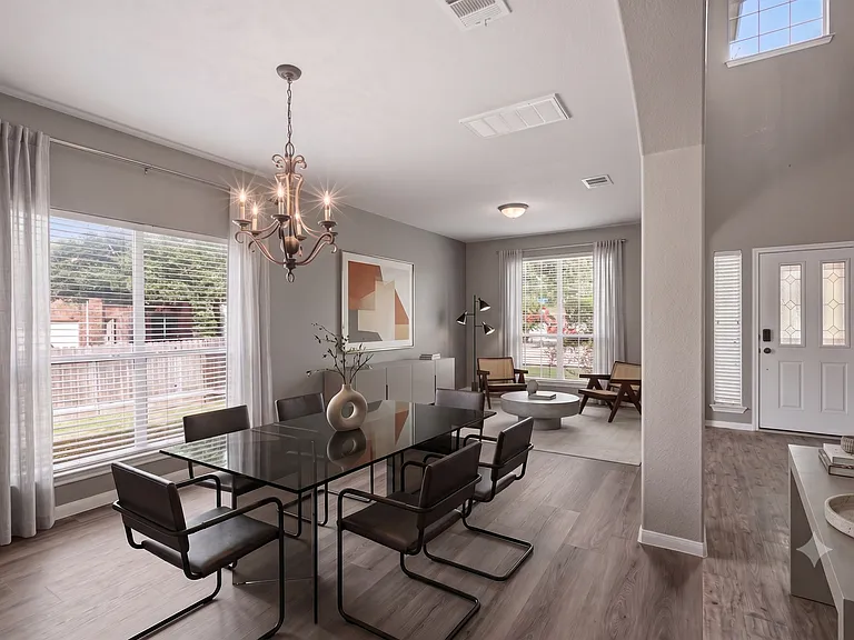 Second living room with dining area and sitting area