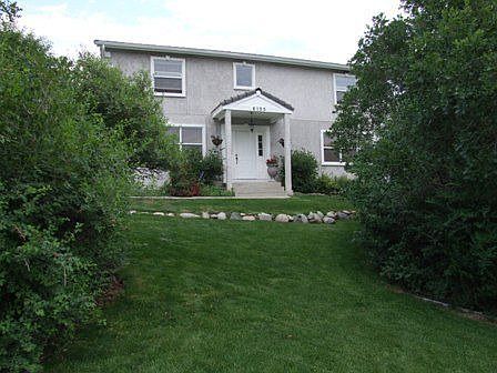 front of house, which faces west; springtime