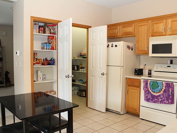 Large Kitchen - appliances included including 2 large storage pantries.