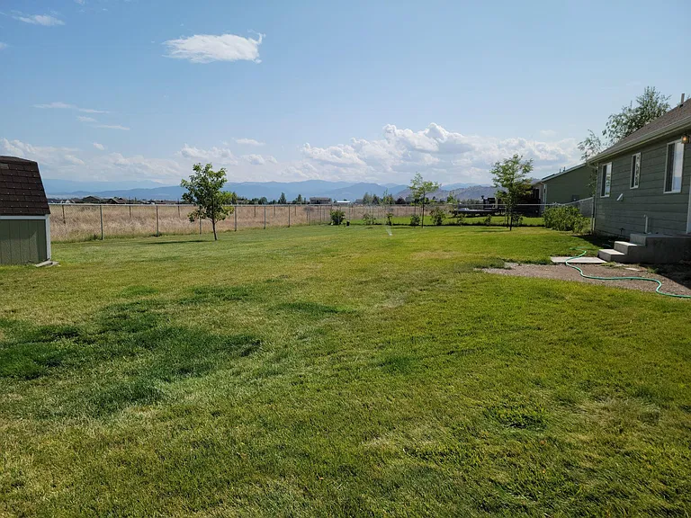 Large fenced in back yard.