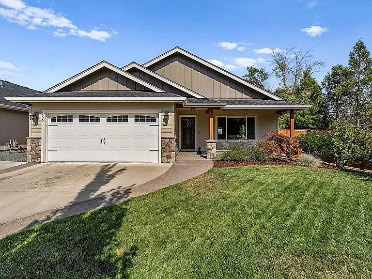 Beautifully landscaped yard complete with sprinklers. Yard care included in rent.