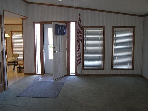 Large living room with cathedral ceiling