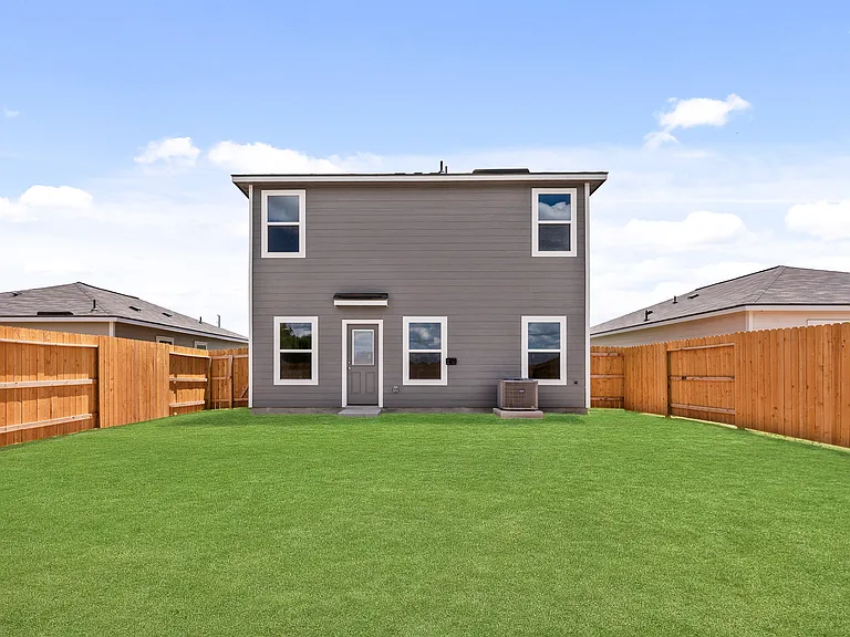 Spacious backyard for the kids and dogs to play.