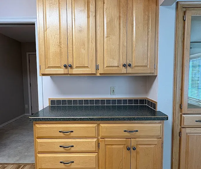 Beautifully updated kitchen, Custom Maple Cabinetry.