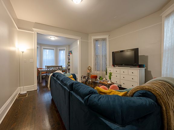 view of double parlor living room and dining room