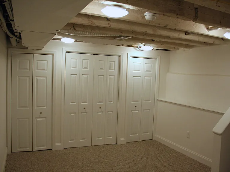 Basement/Man cave with washer/dryer and Full bathroom.