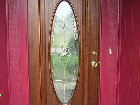 New wood and glass front door