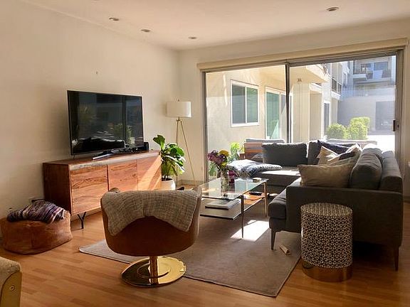 Living Room opens to Courtyard
