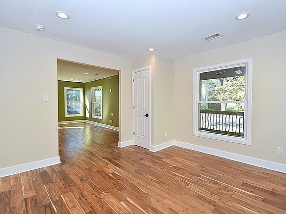 Looking from the Flexible Room towards the Living Room. 100% all new electrical, all new wiring, new panel, new breakers, new outlets, new switches, new dimmers, all LED lights. House prewired for solar panel installation