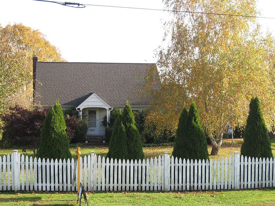 Country Cape with picket fence