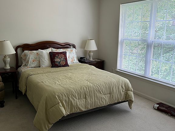 Queen Size Bed with large windows