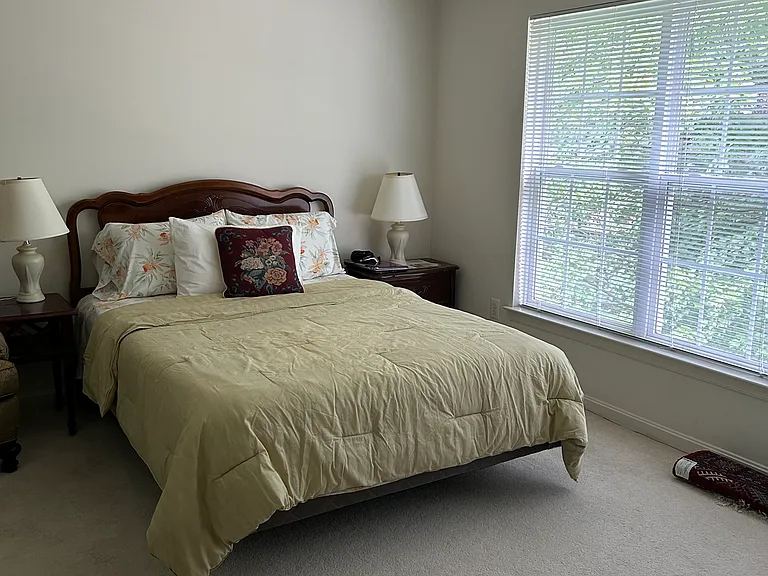 Queen Size Bed with large windows